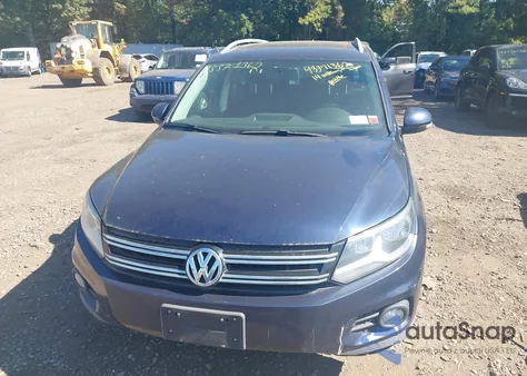 2014 Volkswagen Tiguan Sel from USA, damaged, VIN WVGBV3AX8EW573932